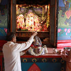 Sundara-krsna Prabhu Bathing Govardhana