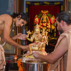 Cleaning ghee off the Deities